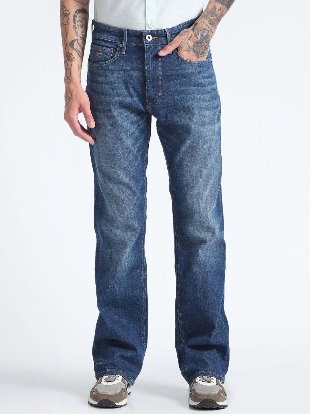 flying machine men blue bootcut mildly distressed light fade stretchable jeans
