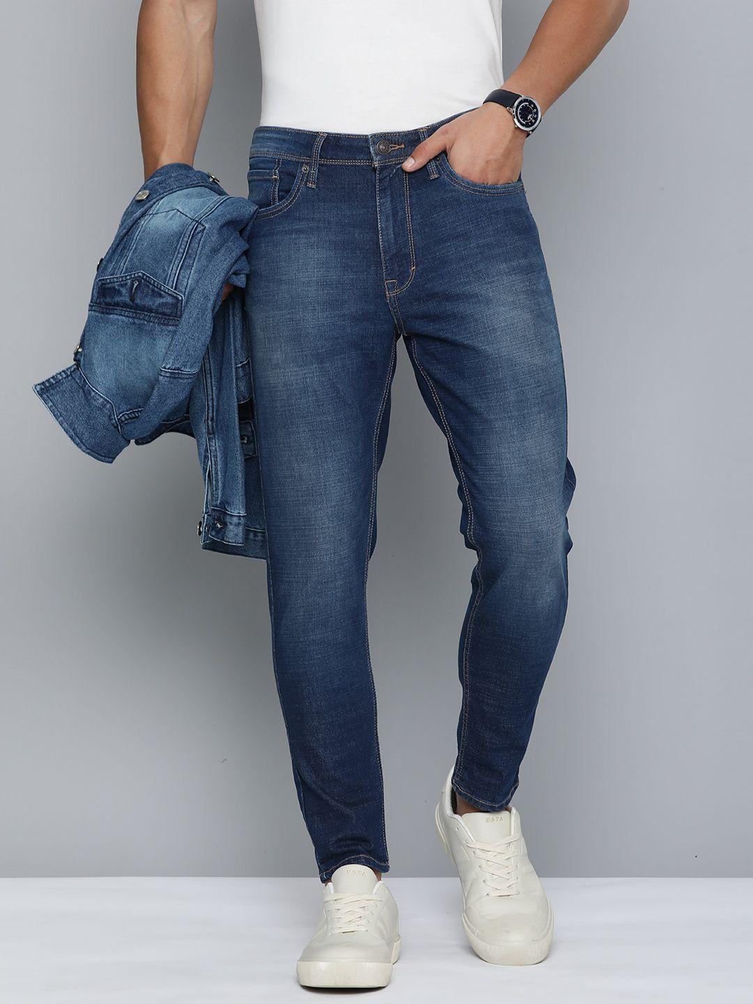 flying machine men mid rise tapered fit light fade stretchable jeans