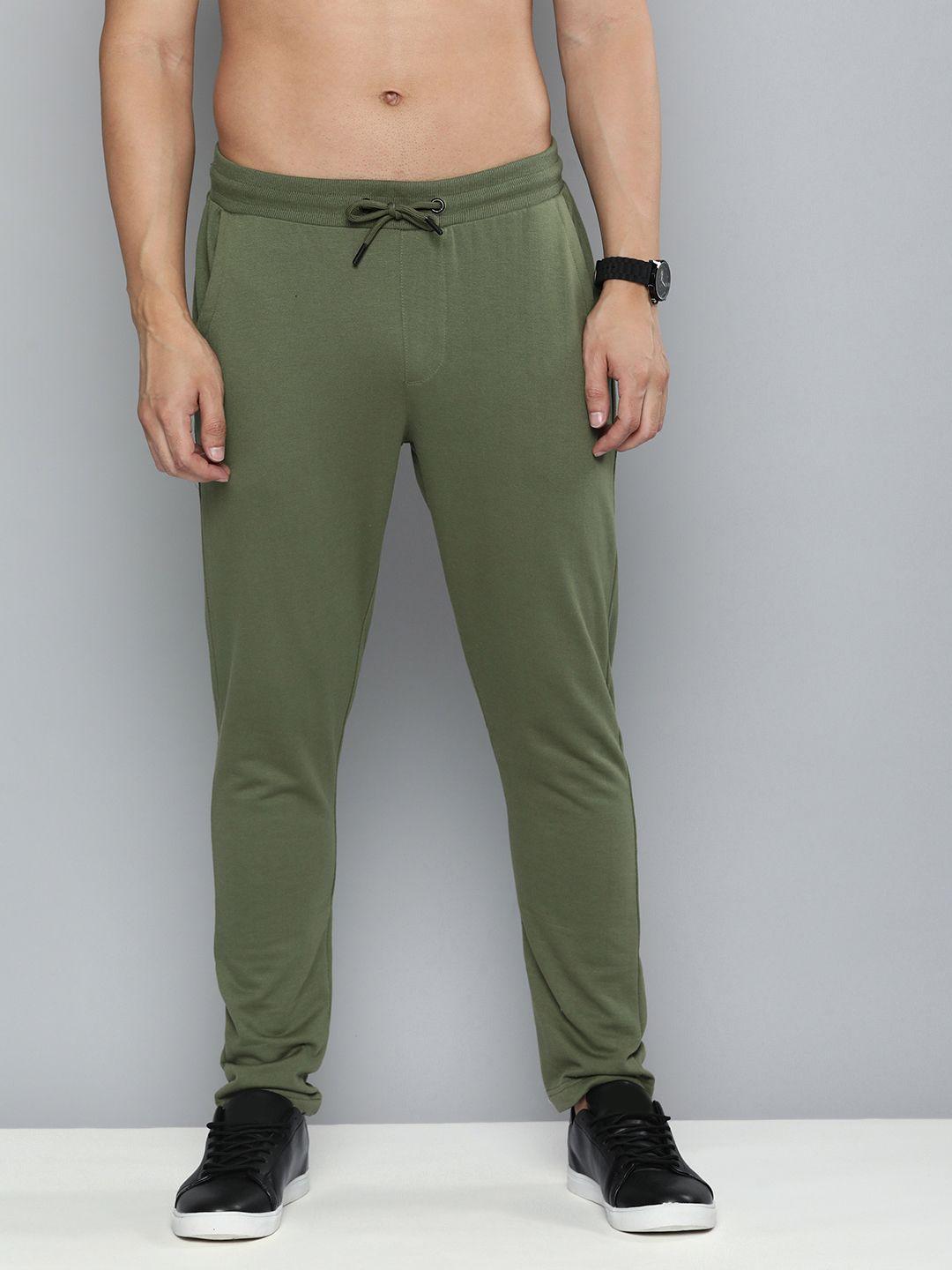 flying machine men olive green solid mid-rise regular track pants