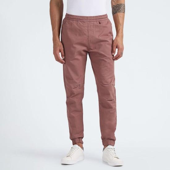 flying machine men solid regular fit jogger style trousers