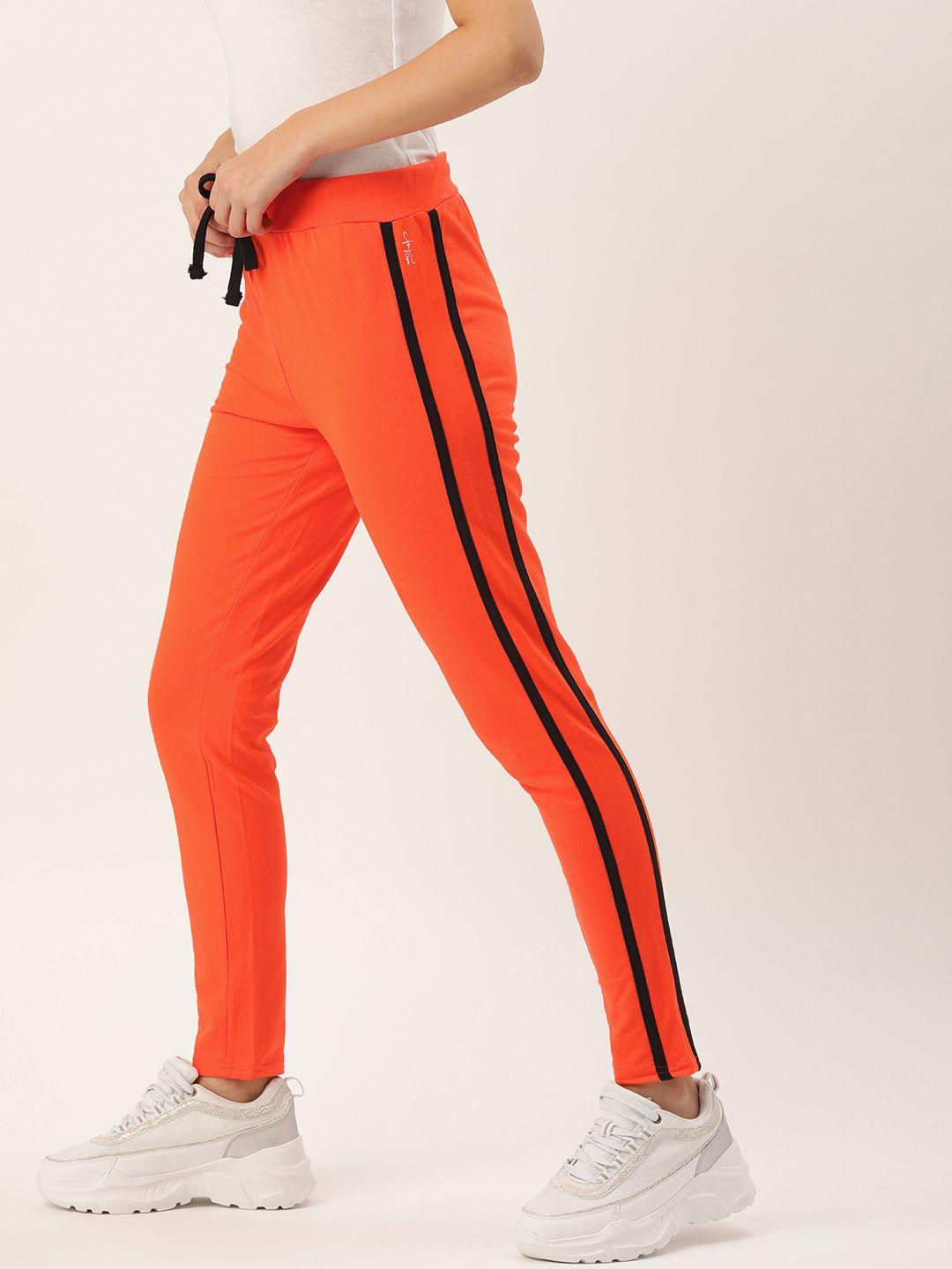 flying machine women orange solid cropped track pants with side stripe detail