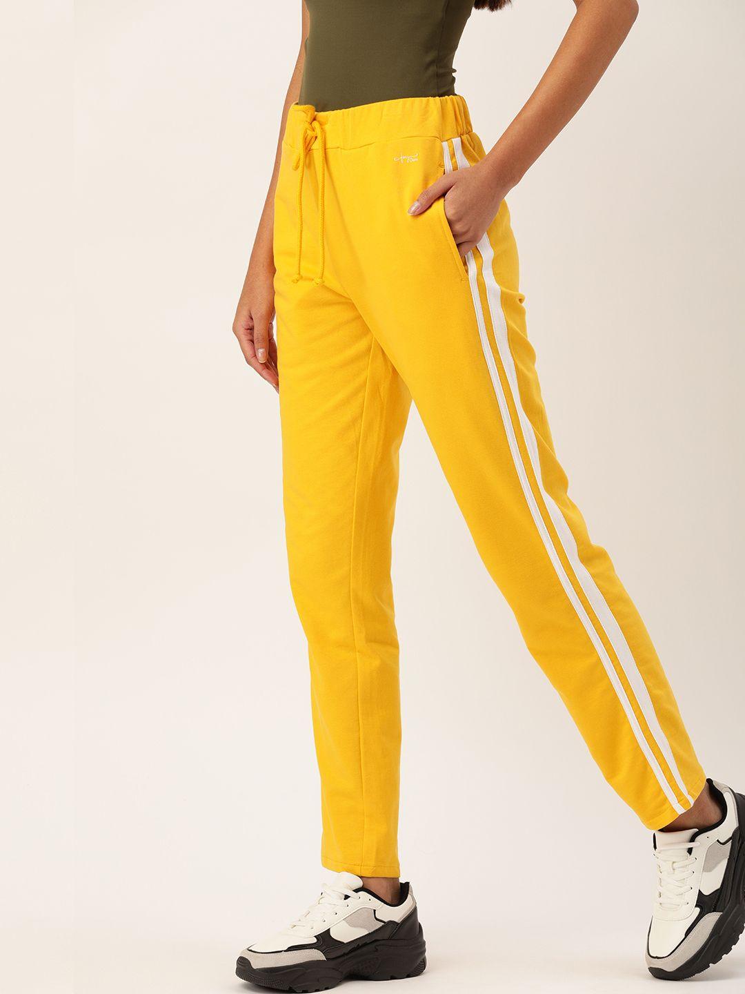 flying machine women yellow solid track pants with side stripe detail