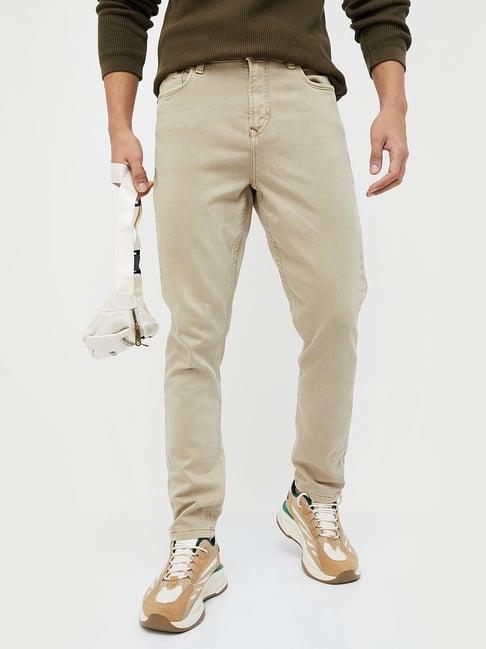 forca by lifestyle beige cotton regular fit trousers