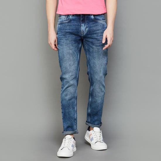 forca men heavily washed slim tapered jeans