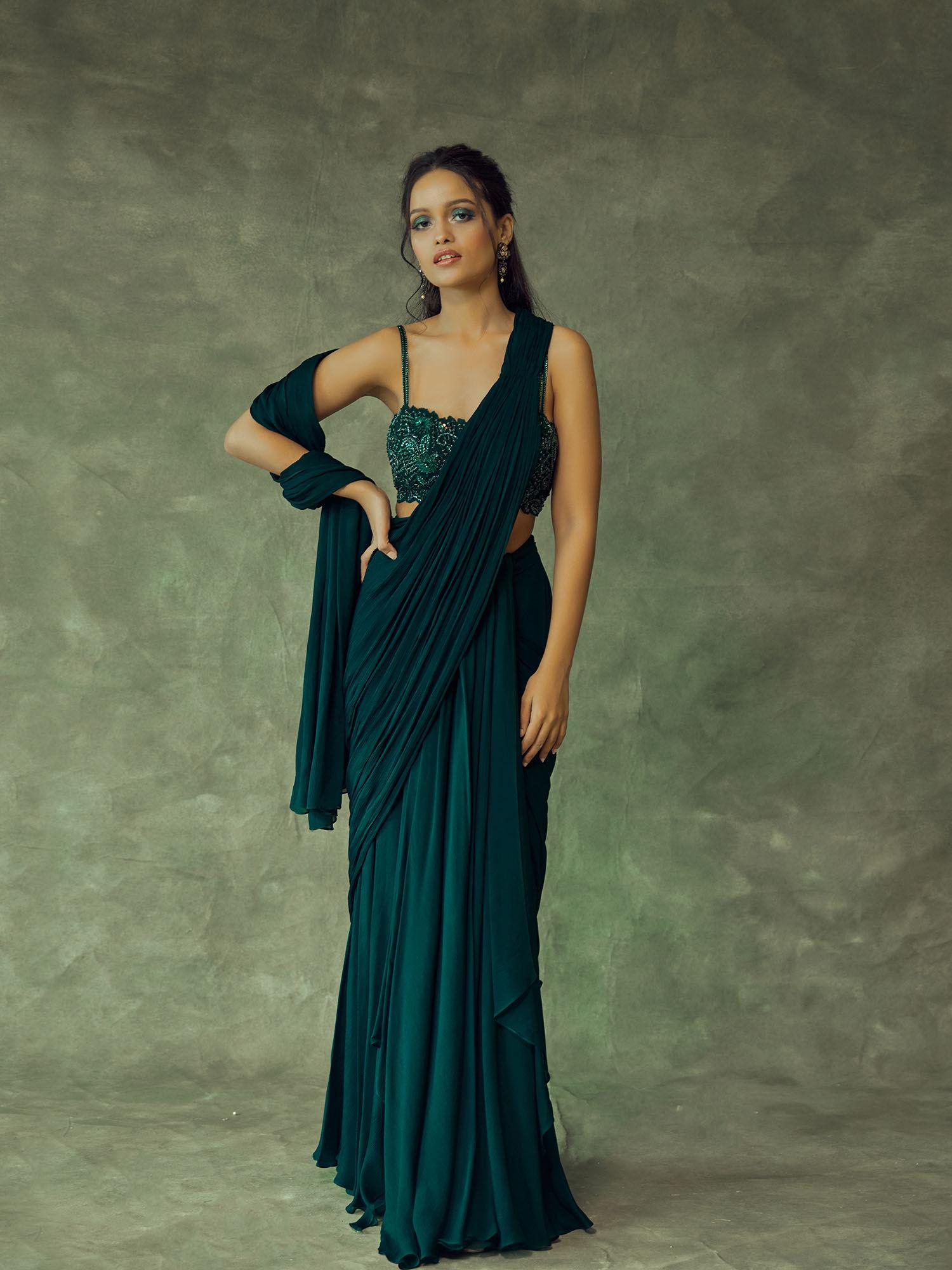 forest green draped saree with blouse with stitched