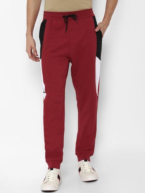 forever 21 maroon  regular fit printed joggers