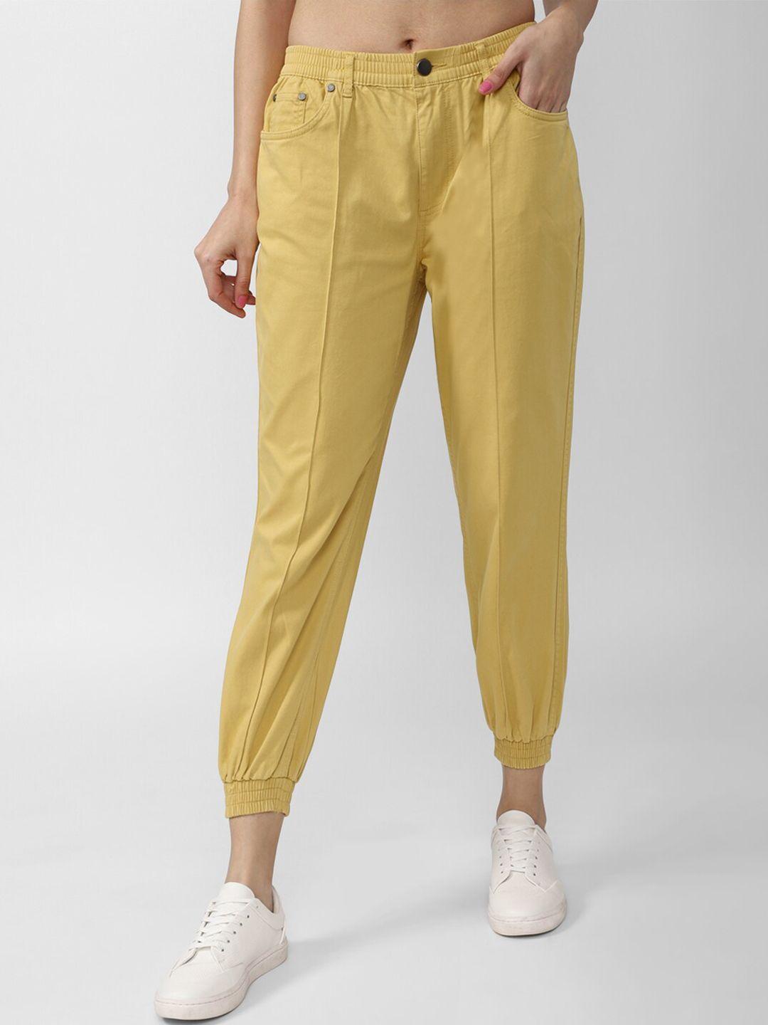 forever 21 women yellow solid joggers trousers