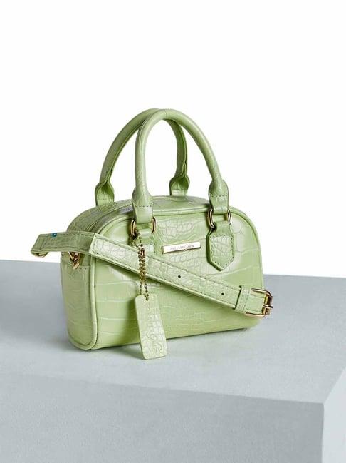 forever glam by pantaloons green animal effect medium satchel handbag