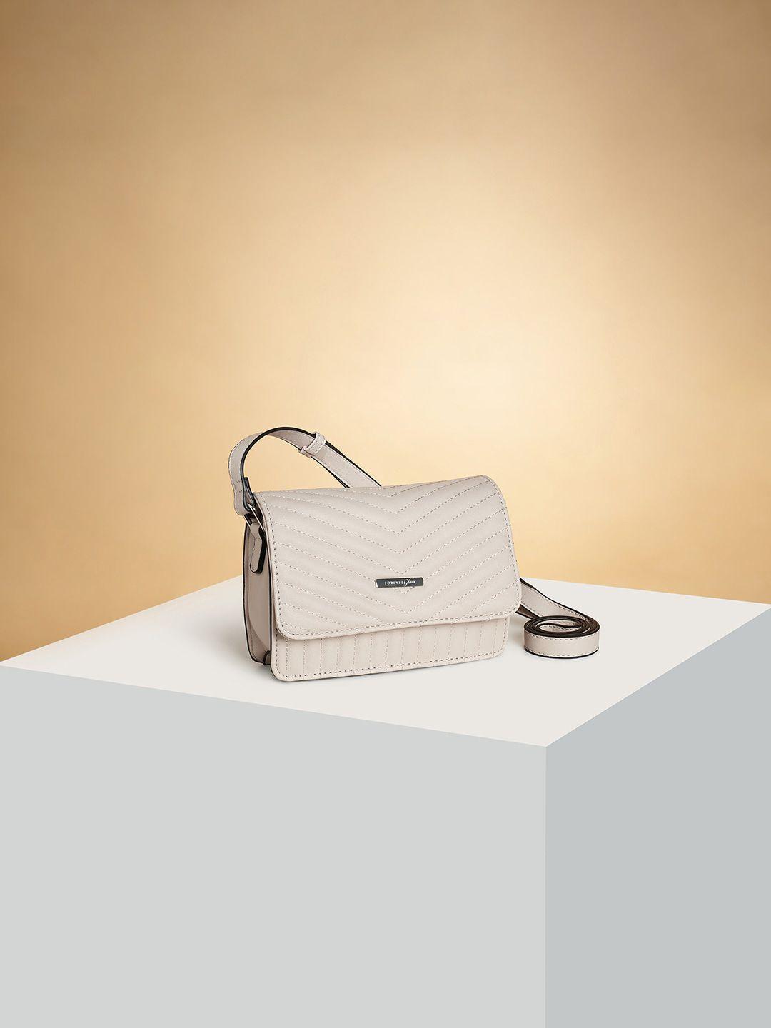 forever glam by pantaloons off white colourblocked pu structured handheld bag with bow detail