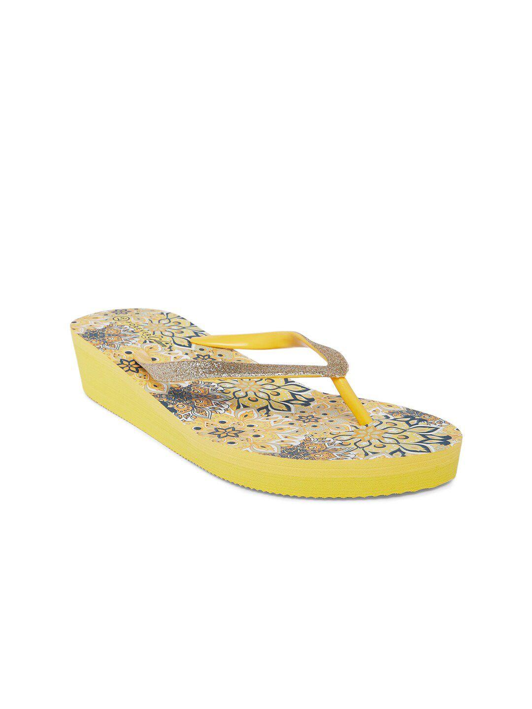 forever glam by pantaloons women yellow & blue printed thong flip-flops