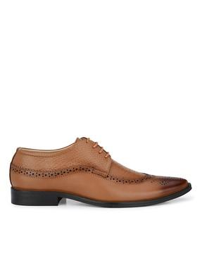formal lace-up shoes with laser-cut work