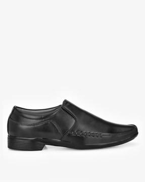 formal slip-on shoes with textured detail