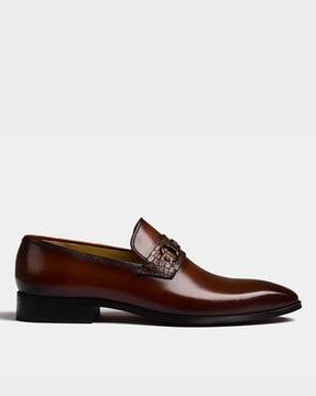 formal slip-on shoes with metal accent