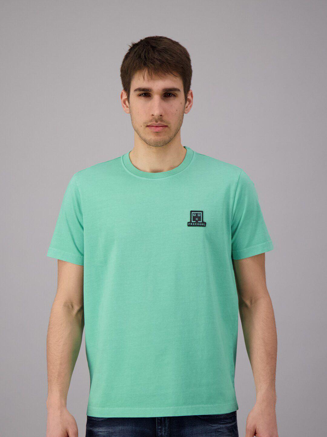 freesoul men green solid t-shirt