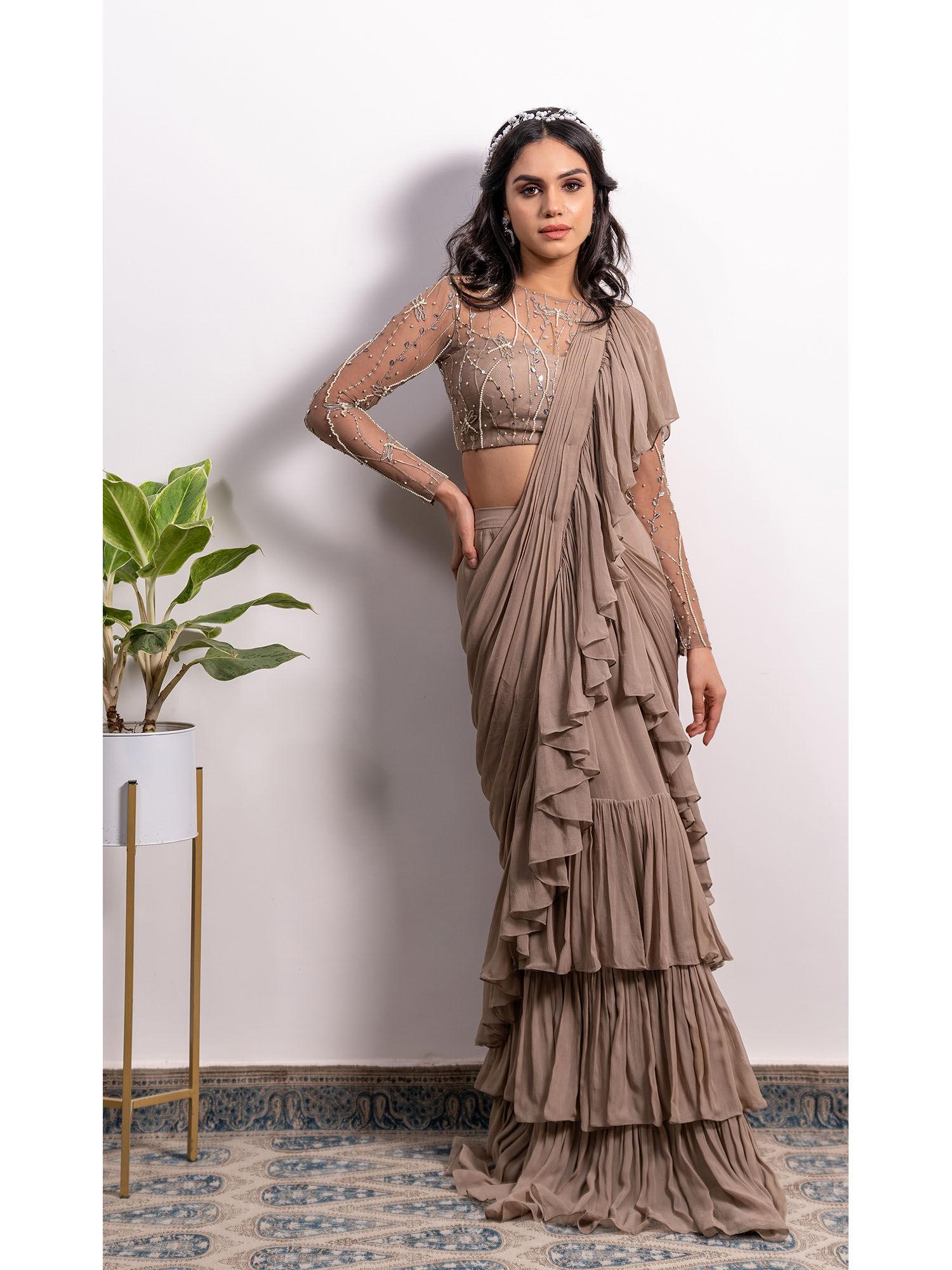 frill saree with pearl strap stitched blouse
