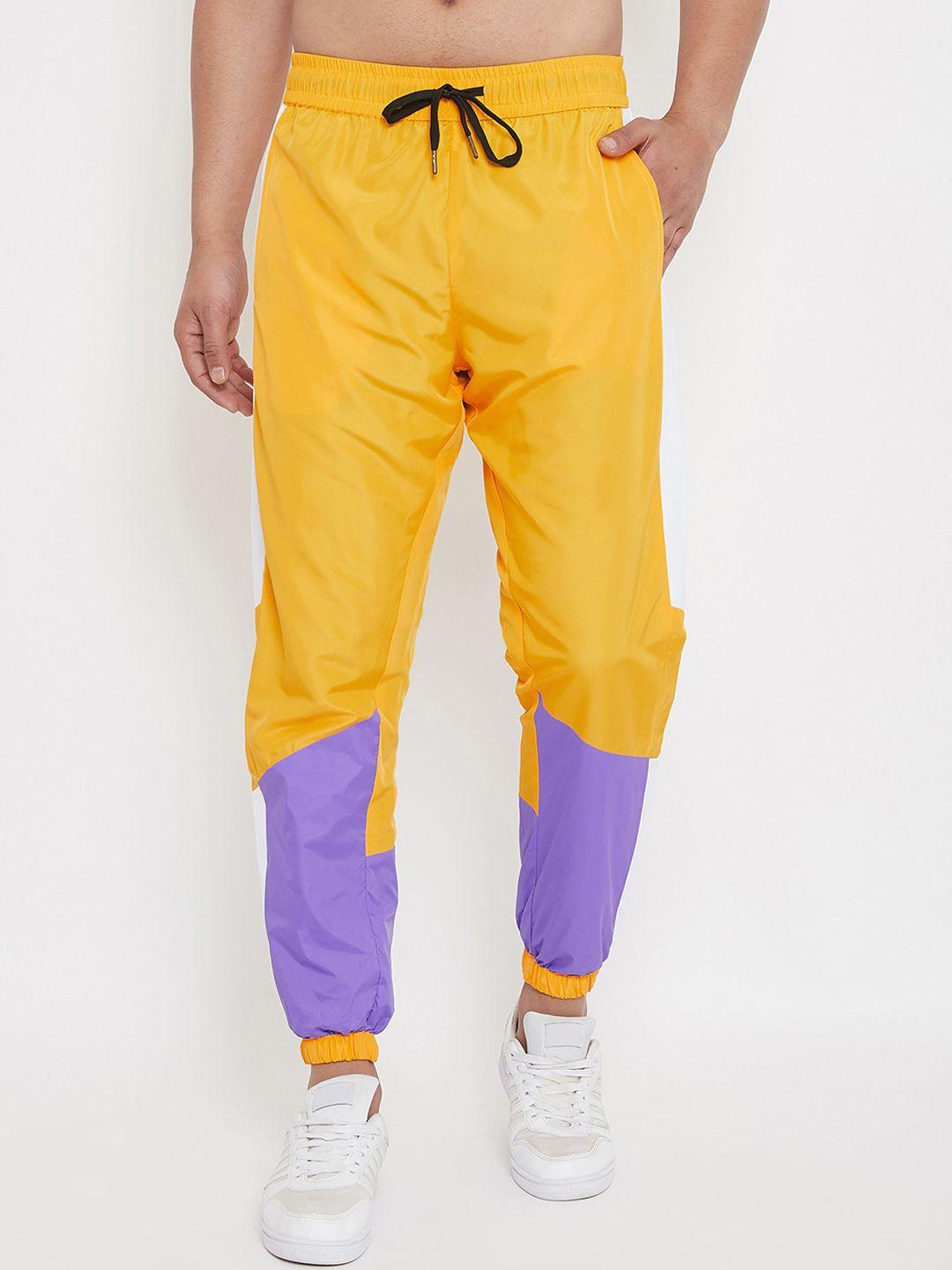 fugazee men yellow & purple colourblocked slim-fit joggers