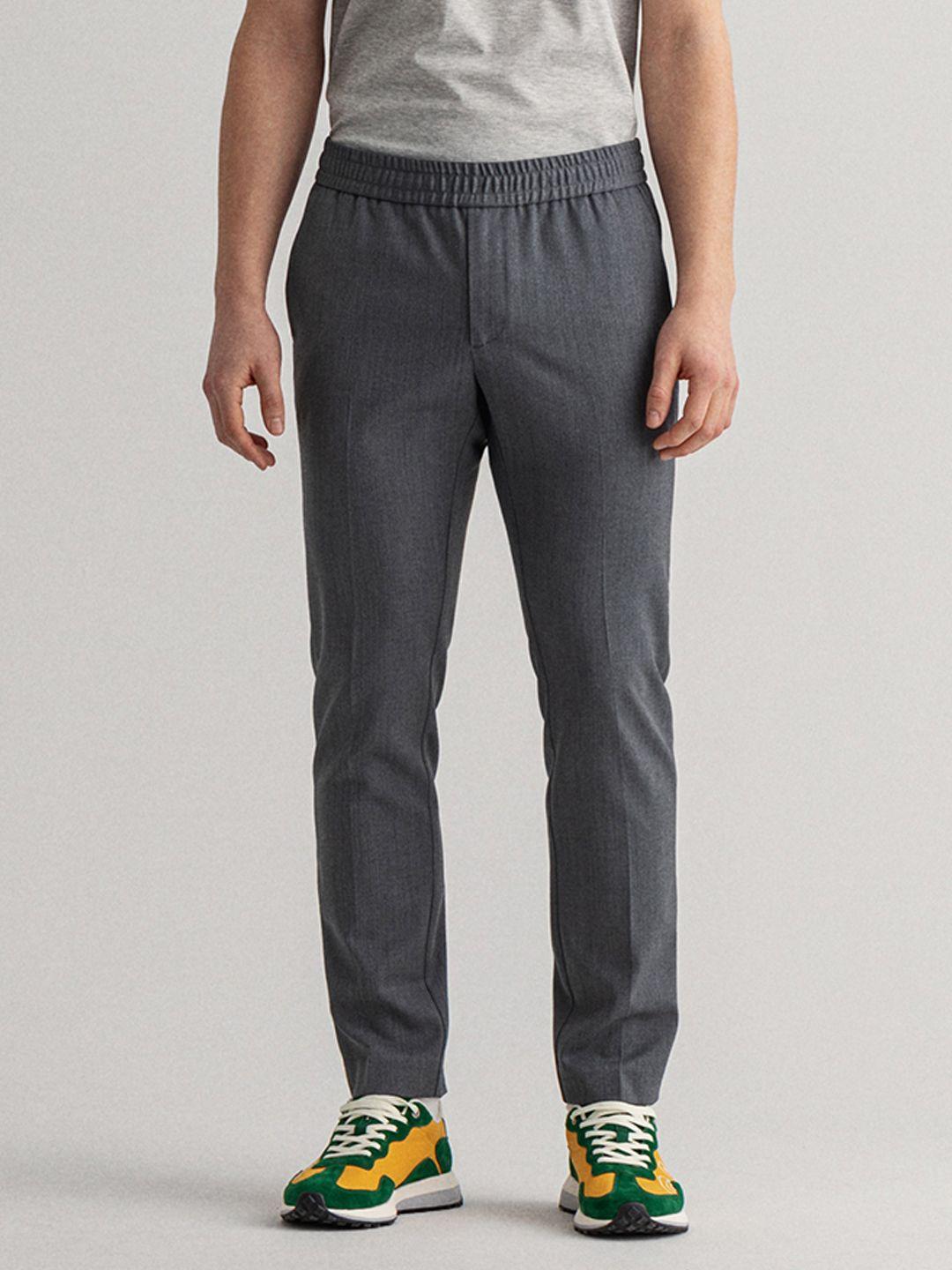 gant men charcoal grey slim fit mid-rise plain casual flat-front trousers