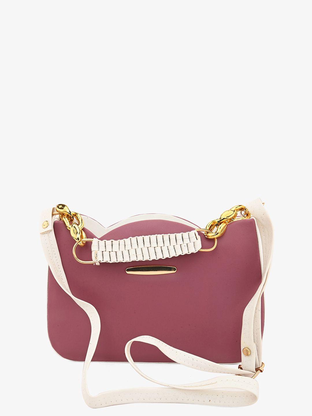 gaura pakhi structured handheld bag with fringed