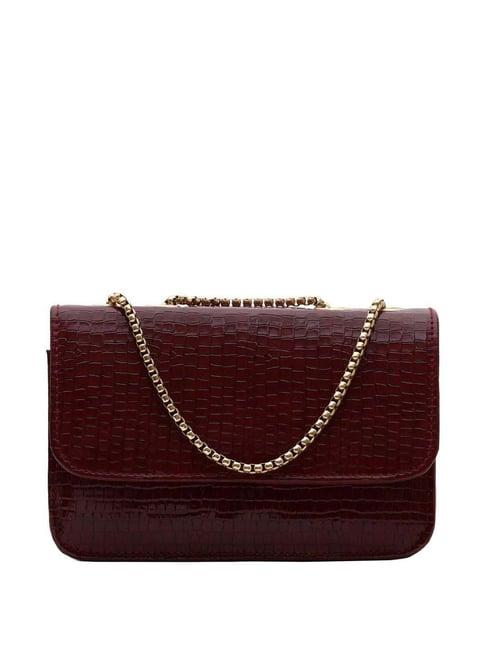 gaurapakhi maroon textured small sling handbag