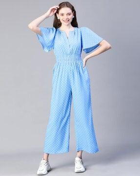 geometric print jumpsuit with bell sleeves