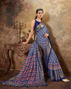geometric print saree with contrast border & tassels