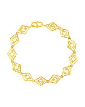 geometric-design yellow gold link bracelet