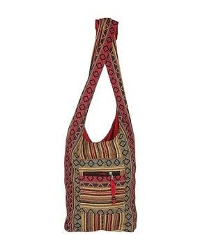 geometric embroidered sling bag