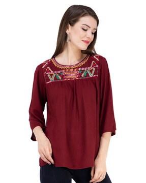 geometric embroidered tunic