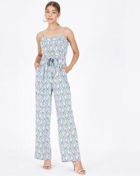 geometric print jumpsuit with strappy sleeves