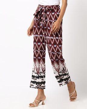 geometric print palazzo pants with waist tie-up