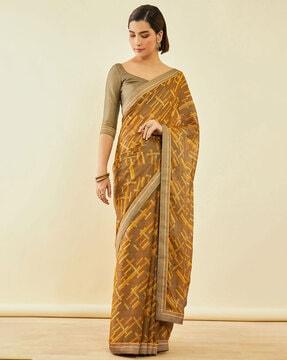 geometric print saree with lace border