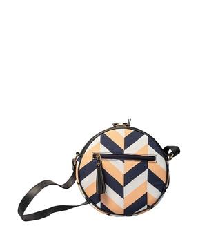 geometric print sling bag with tassels