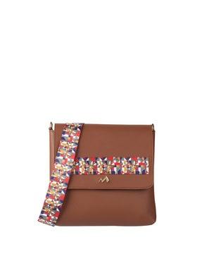 geometric print slingbag with flap closure