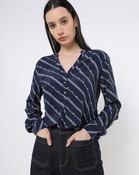 geometric print top with back pleat