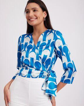 geometric print wrap top