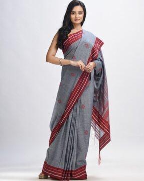 geometric woven design saree with contrast border