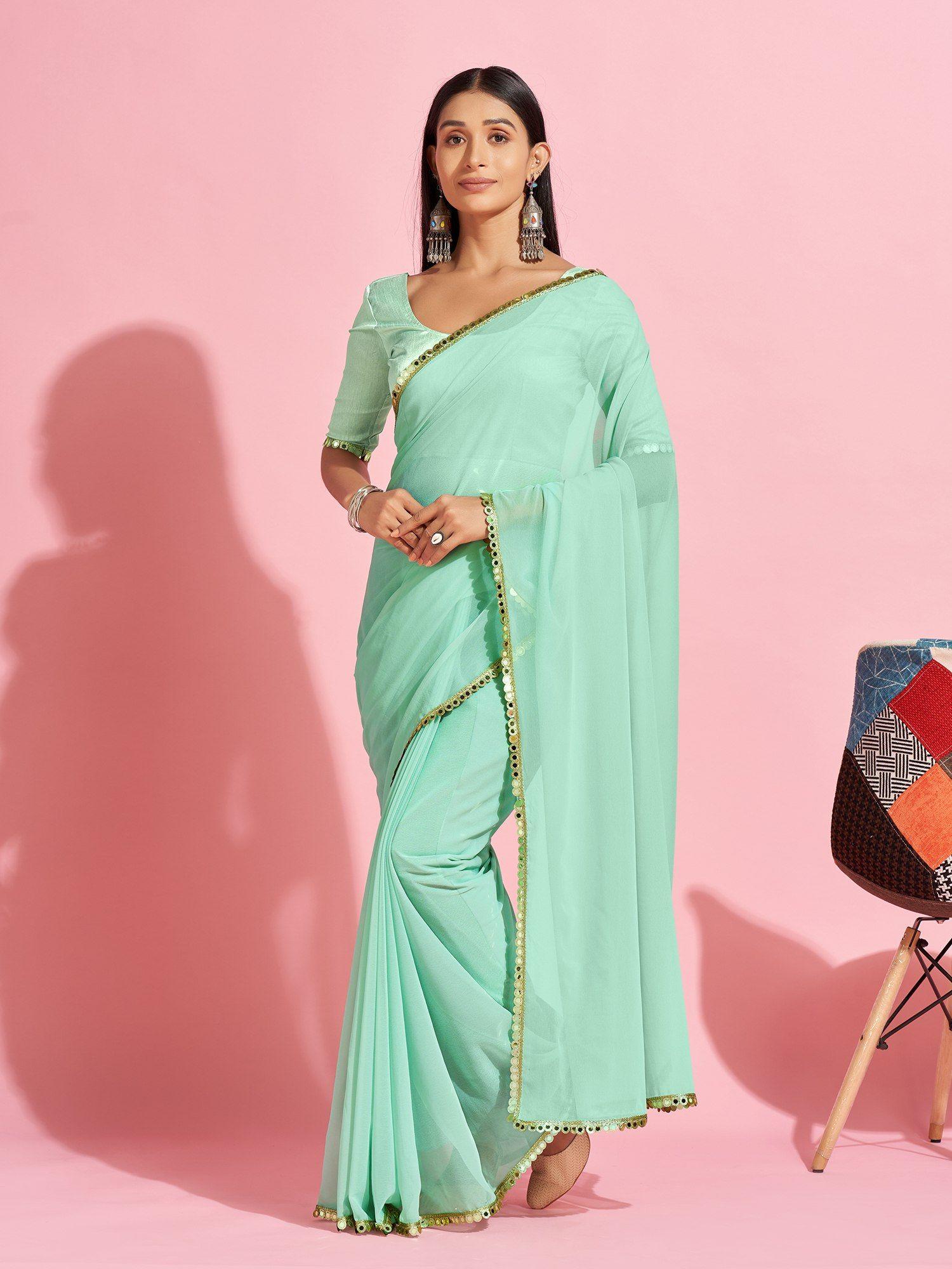 georgette sea green solid and embellished designer saree with blouse piece