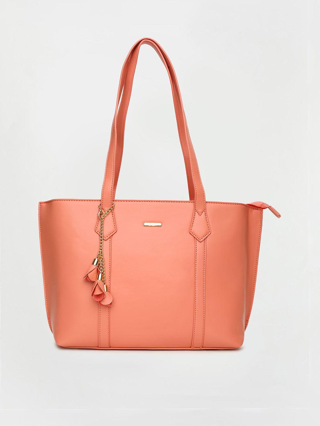 ginger by lifestyle pink structured shoulder bag with tasselled