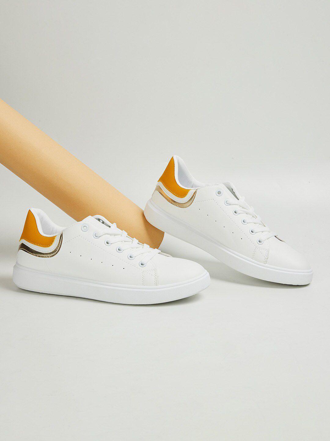 ginger by lifestyle women yellow perforations pu sneakers