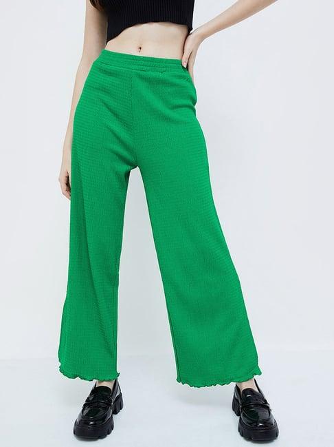 ginger by lifestyle green self pattern flared pants