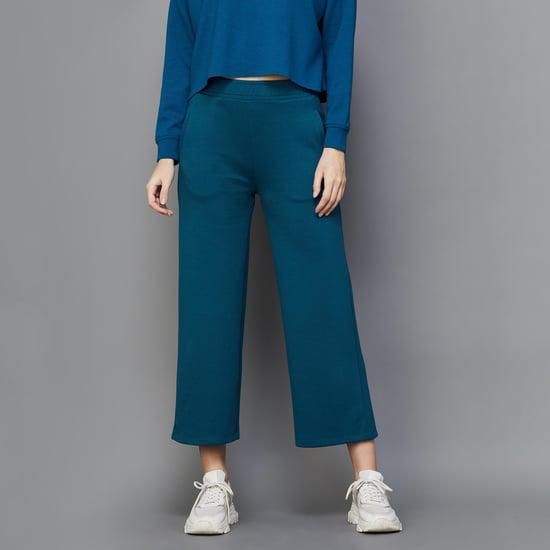ginger women solid elasticated cropped trousers