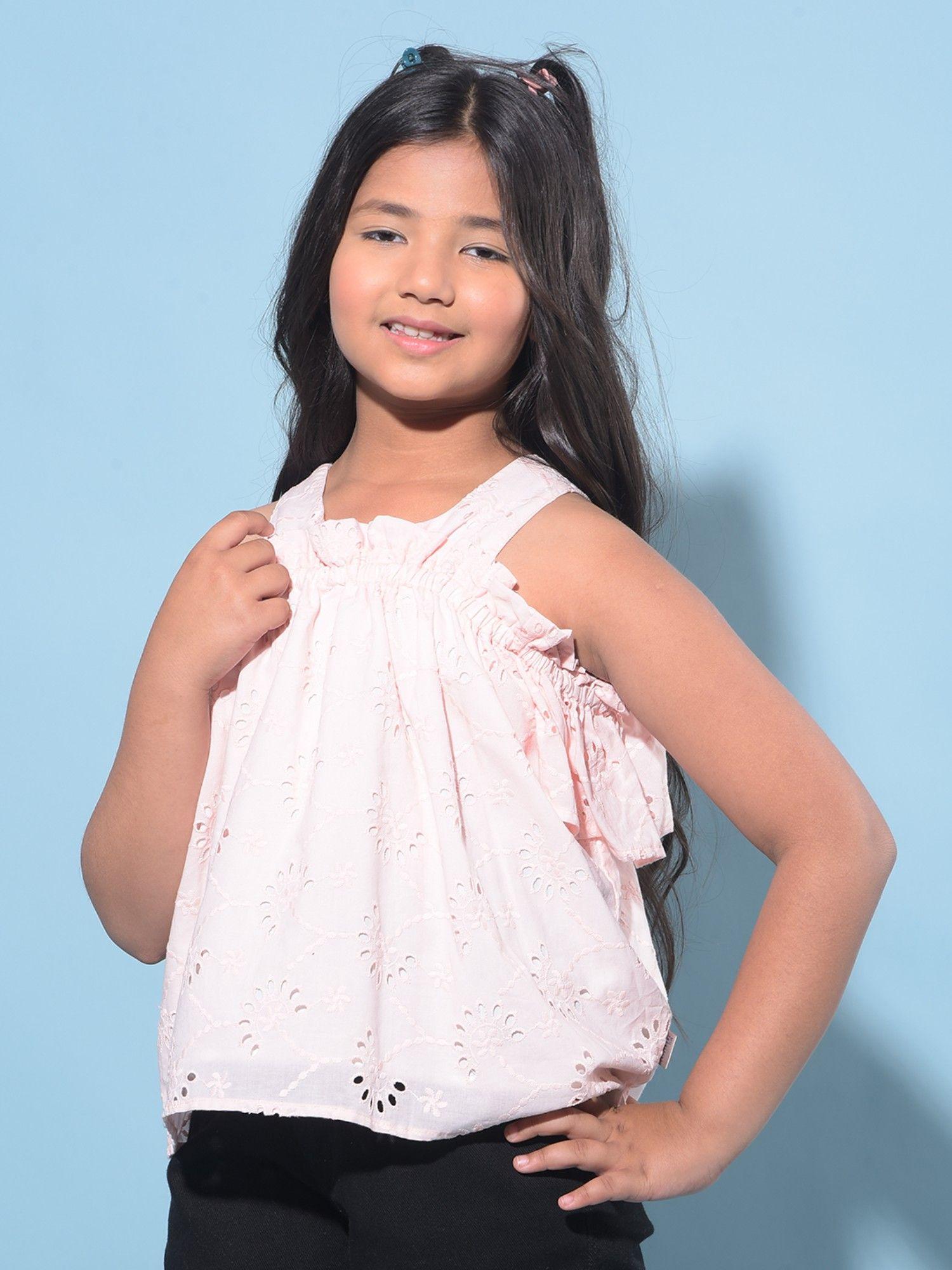girl's peach embroidered top
