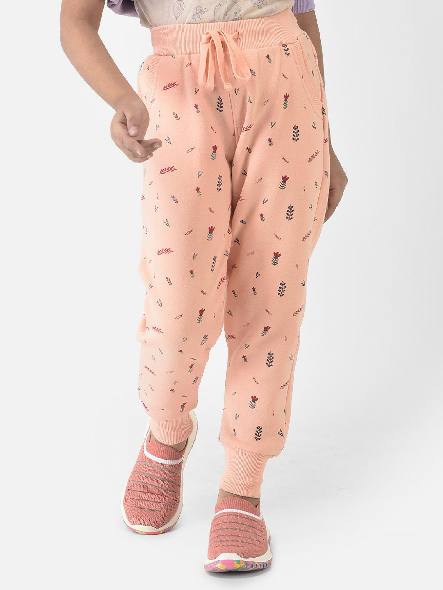girls peach joggers with floral print