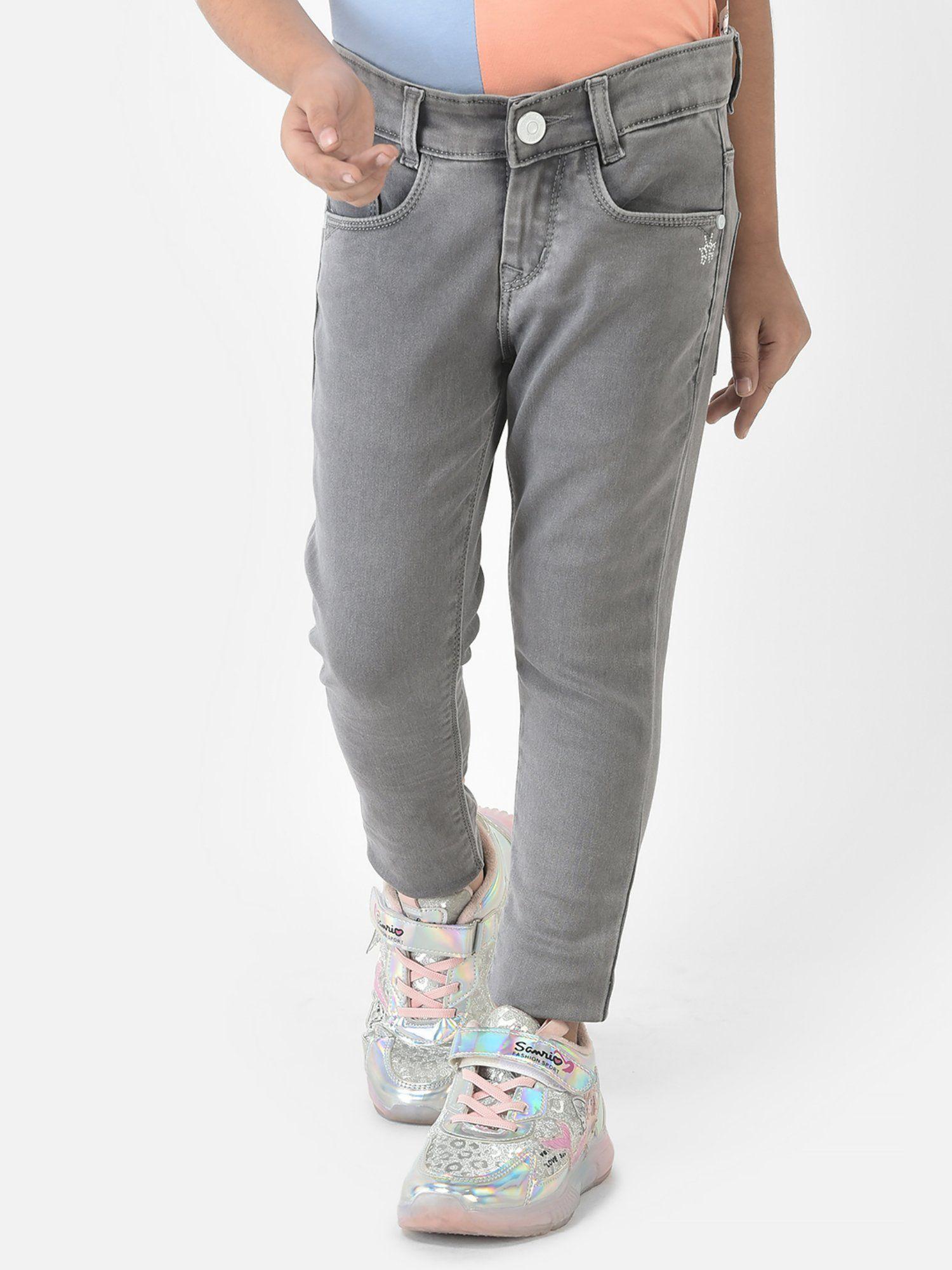 girls grey jeans with logo detailing
