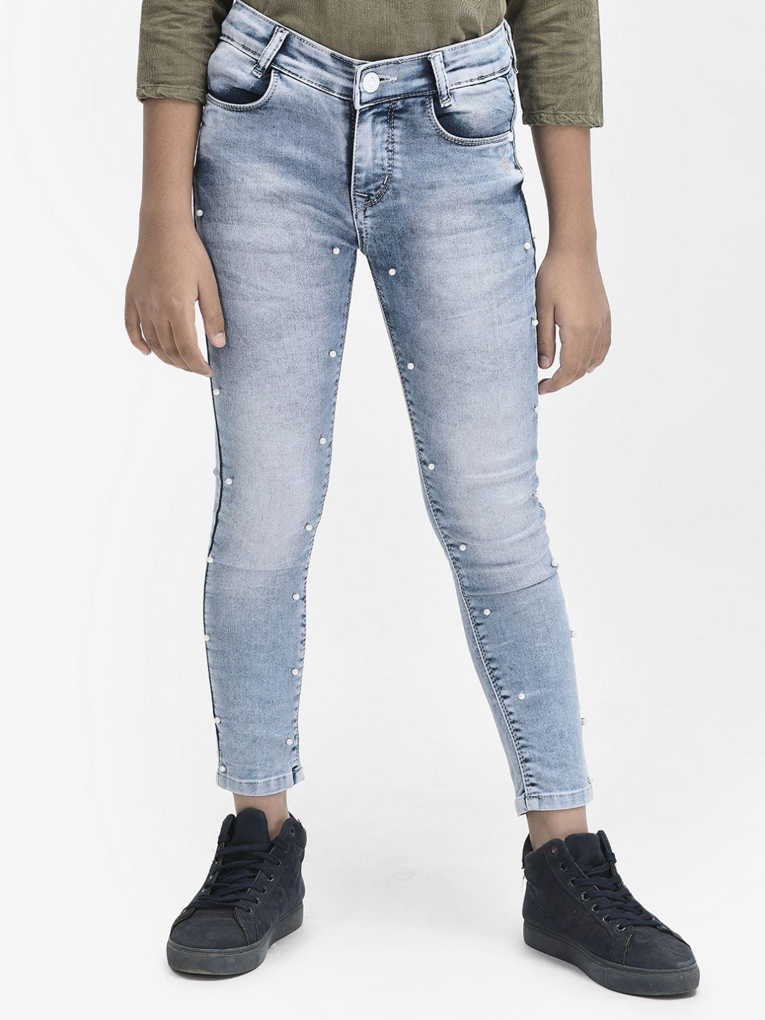 girls light blue heavy washed embellished jeans