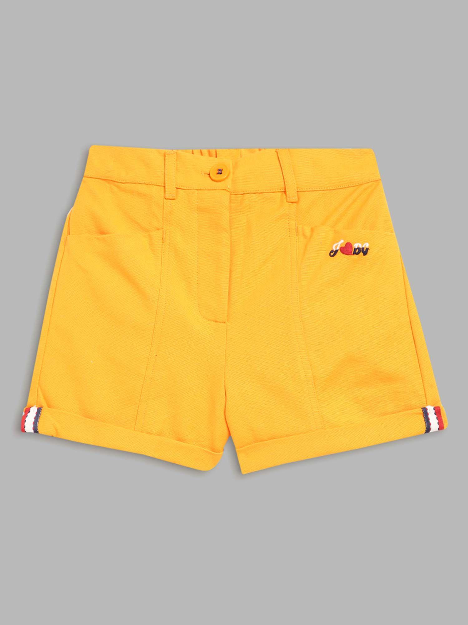 girls orange solid shorts
