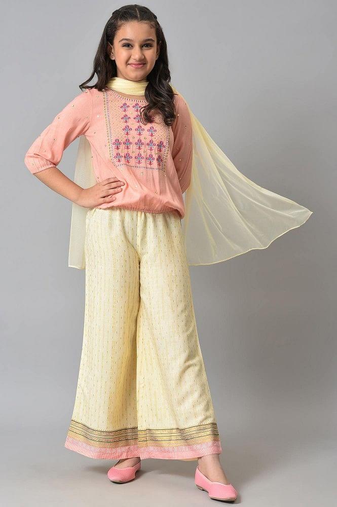 girls peach blouson top with flared palazzo and dupatta