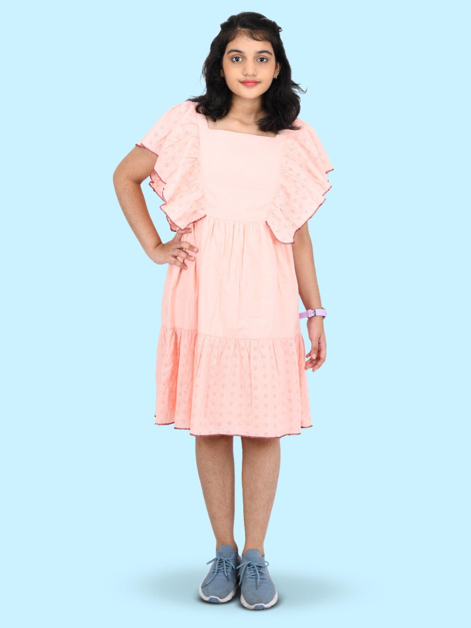 girls peach coloured pure cotton dress