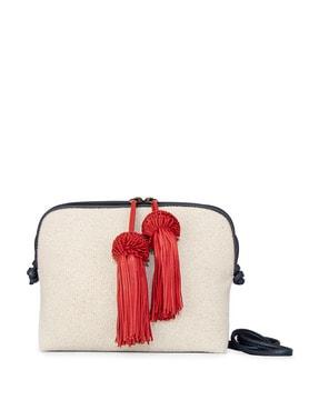 gizmo sling bag with tassels