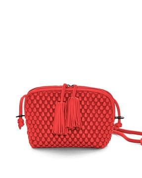 gizmo sling bag with tassels